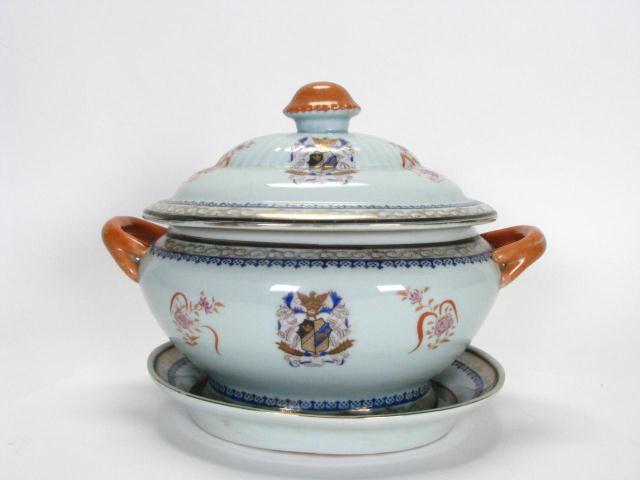 Appraisal: Lidded porcelain tureen pedestal base with floral motif and shield