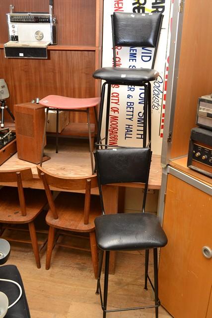 Appraisal: A PAIR OF BLACK VINYL 'S STOOLS AND A MEADMORE