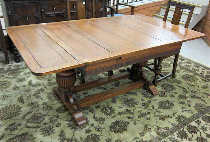 Appraisal: LARGE OAK DRAW-LEAF DINING TABLE English Elizabethan Revival style early