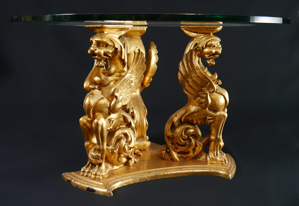 Appraisal: CARVED GILT WOOD GRIFFIN BASE GLASS TOP TABLE A trio