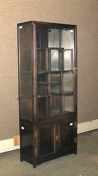 Appraisal: A Chinese wood display cabinet Comprising two parts the upper