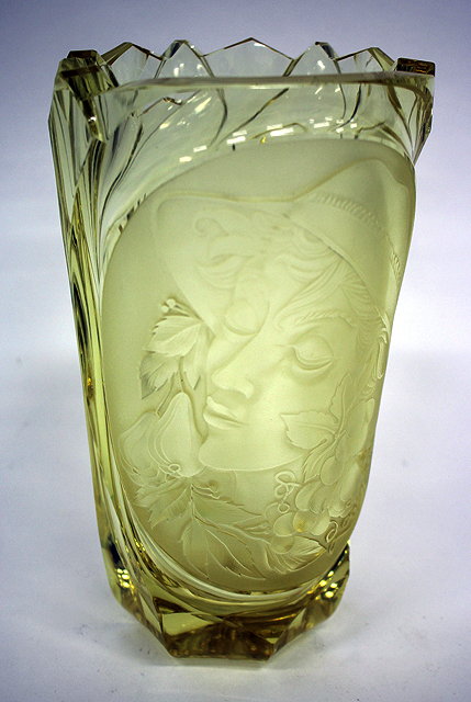 Appraisal: A CZECHOSLOVAKIAN AMBER GLASS VASE by Moser with engraved panel