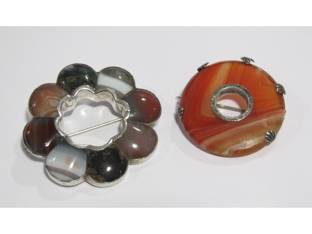 Appraisal: Two Scottish silver and agate brooches one with lobed vari