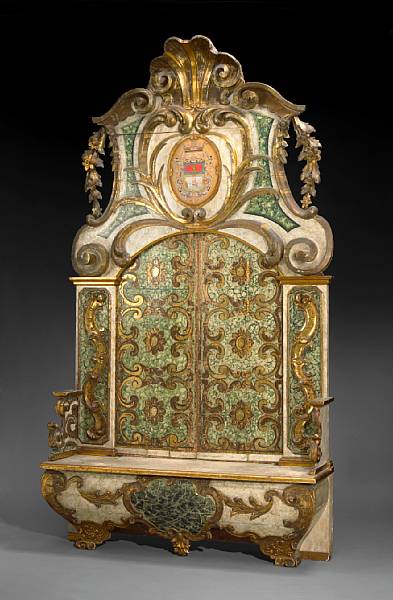 Appraisal: An imposing Italian Baroque parcel gilt and paint decorated cassapanca