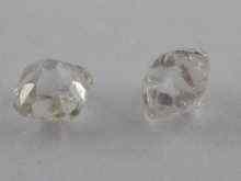 Appraisal: Two loose polished old cut diamonds total weight approx carat