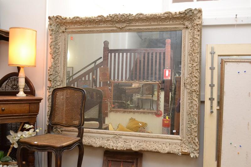 Appraisal: A LARGE CLASSICAL CARVED MIRROR A LARGE CLASSICAL CARVED MIRROR