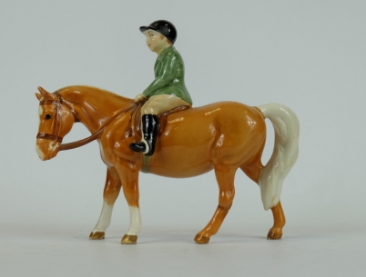 Appraisal: Beswick boy on palomino pony