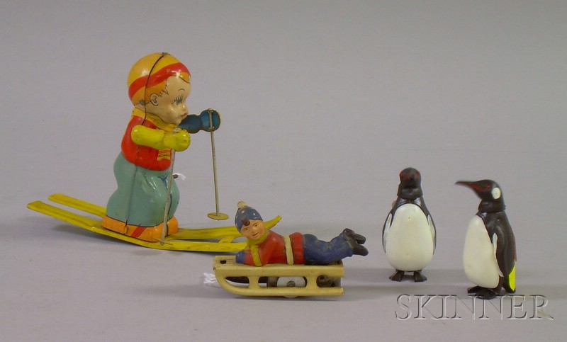 Appraisal: Pair of German Painted Celluloid Penguins a Painted Tin Wind-up