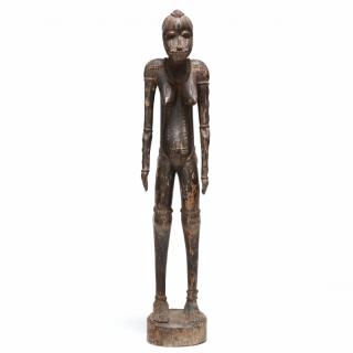 Appraisal: West African Female Figure carved wood a tall figure with