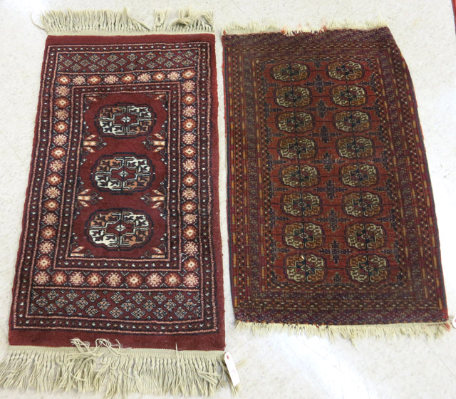 Appraisal: TWO RED BOKHARA AREA RUGS ' X ' semi-antique Turkoman