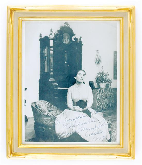 Appraisal: Autographed photograph signed by Maria Callas dated photo of seated