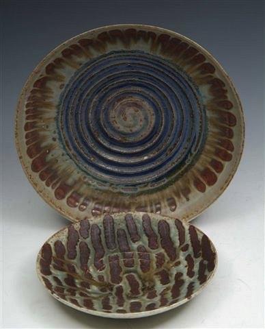 Appraisal: A DEREK DAVIS SHALLOW BOWL cream glaze with swirling blue