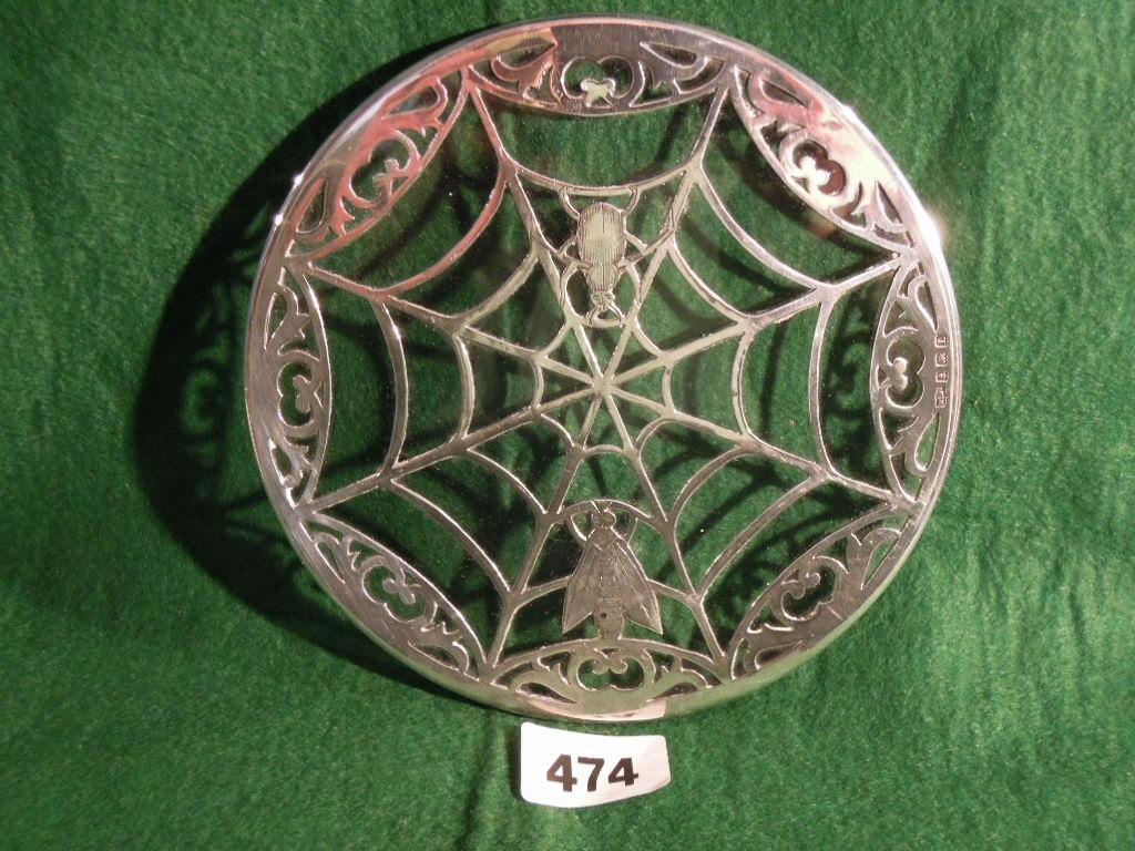 Appraisal: A silver and glass wine coaster in the form of