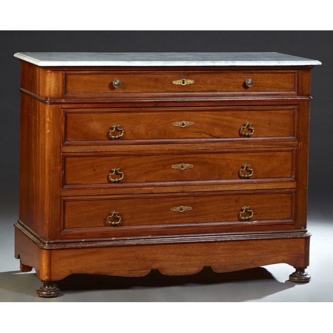 Appraisal: French Carved Walnut Marble Top Commode c the stepped rounded