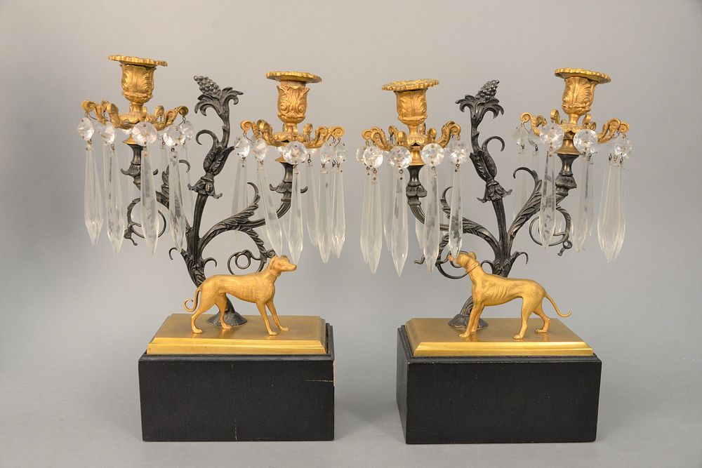 Appraisal: Pair of Regency Dog Candelabra each having two scrolling arms