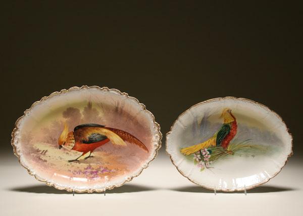 Appraisal: Limoges platters signed hand painted game birds embossed gilt rims