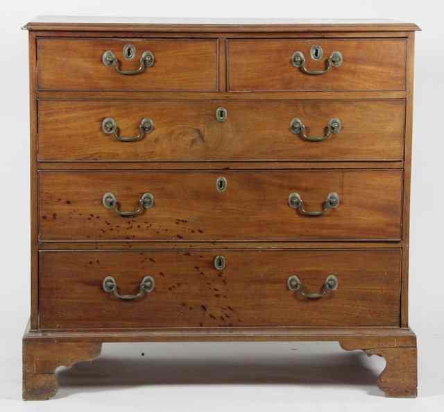 Appraisal: A George III mahogany chest fitted two short over three