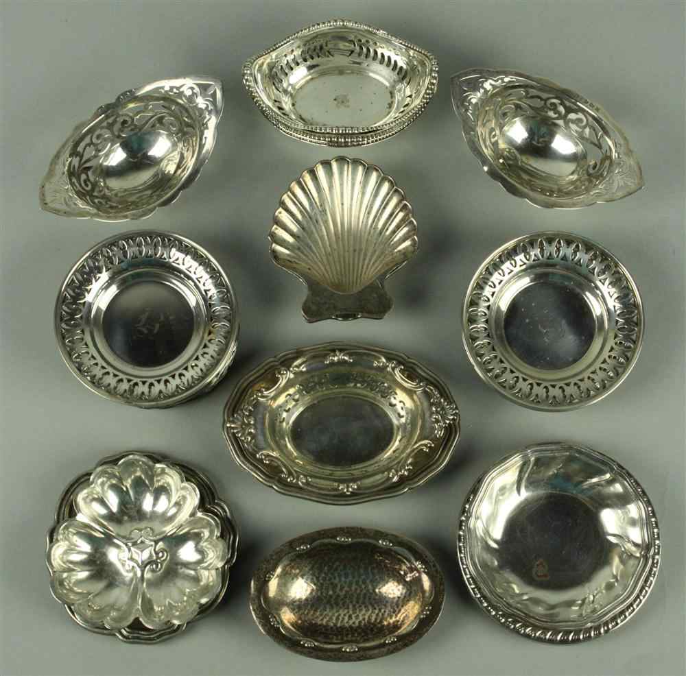 Appraisal: FOUR STERLING OPENWORK NUT DISHES approx troy oz - together