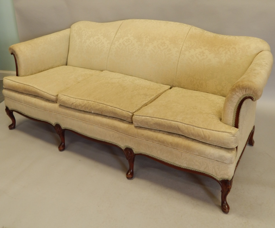 Appraisal: A mid thC mahogany three seat sofa upholstered in damask