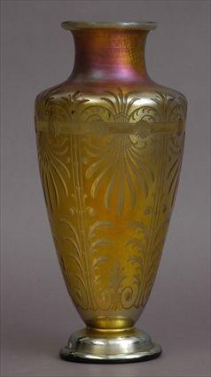 Appraisal: TIFFANY STUDIOS ENGRAVED FAVRILE GLASS VASE The urn-form body decorated