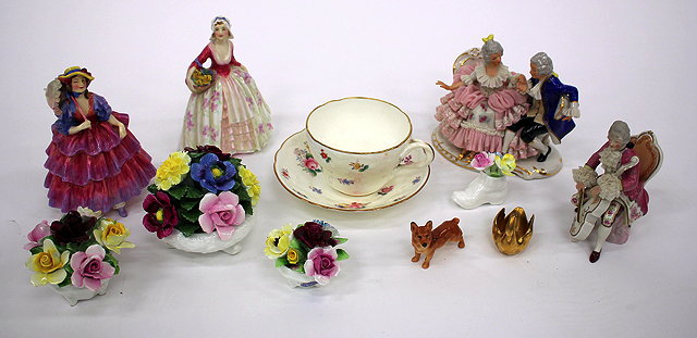 Appraisal: A ROYAL DOULTON PORCELAIN FIGURINE 'Hinged Parasol' HN together with