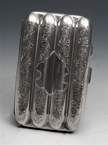 Appraisal: A SILVER CIGAR CASE engraved with floral and scroll designs