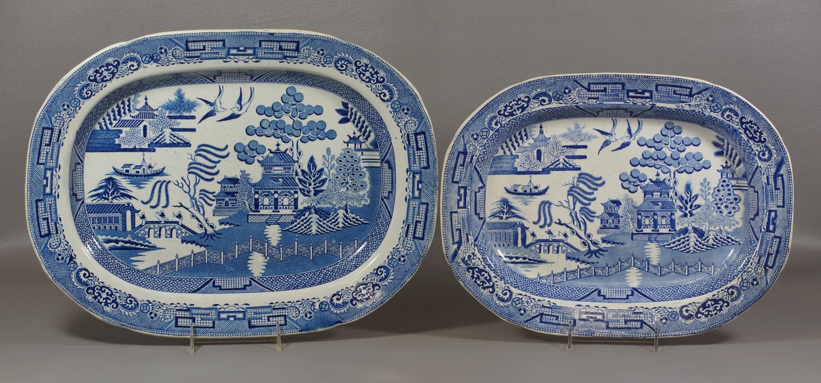 Appraisal: English Staffordshire Blue Willow Platters largest - wide marked Stone