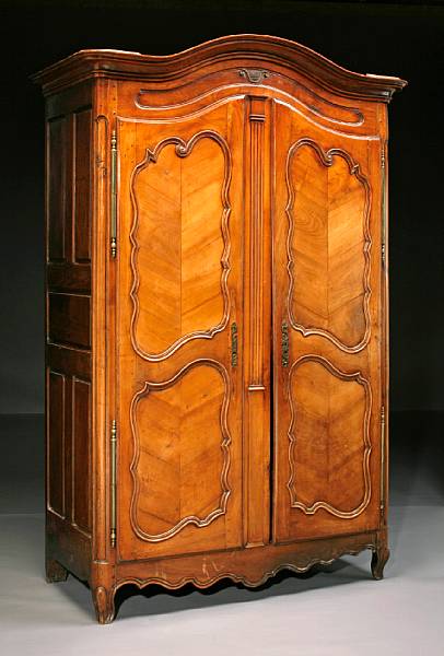 Appraisal: A Louis XV oak and fruitwood armoire third quarter th