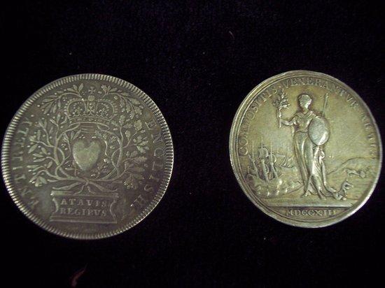 Appraisal: Two unusual medallions bearing the bust of Queen Anne one