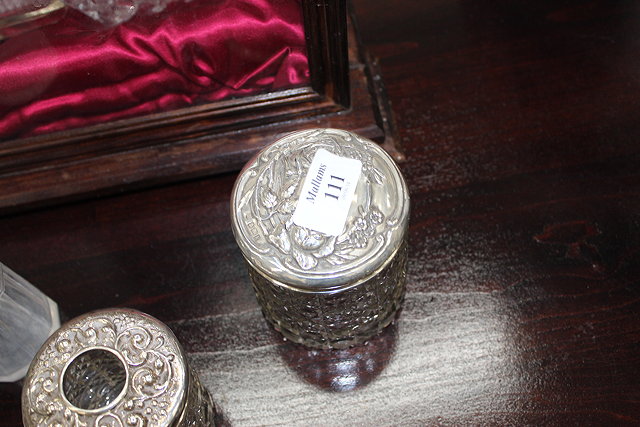 Appraisal: A GROUP OF EIGHT SILVER TOPPED AND MOUNTED ITEMS to