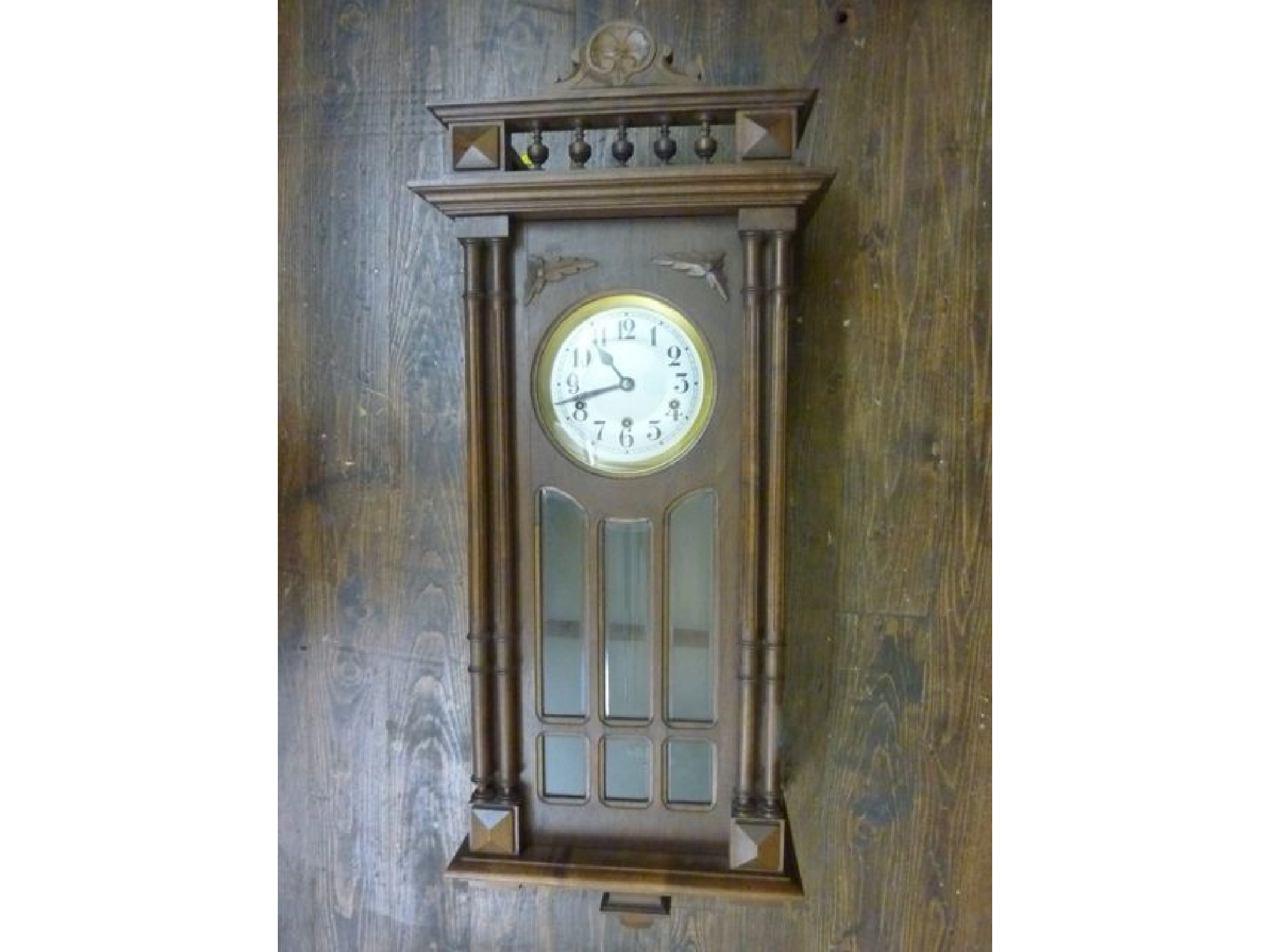 Appraisal: An early th century continental wall clock in a walnut