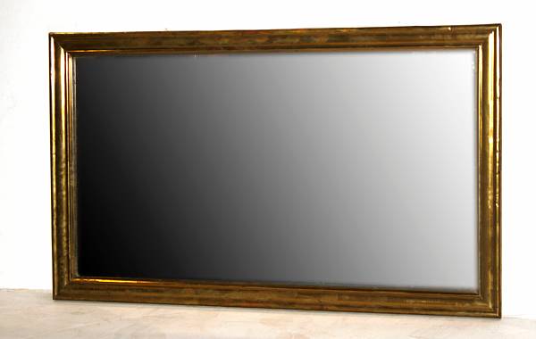 Appraisal: A Victorian brass mirror th century height ft in width