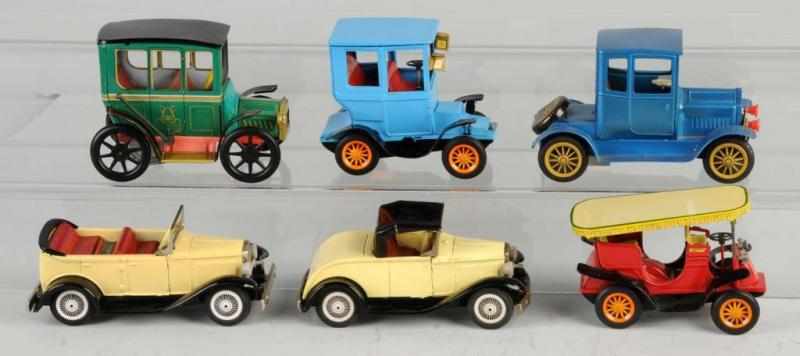 Appraisal: Lot of Tin Old-Timer Vehicle Friction Toys Description Japanese Working