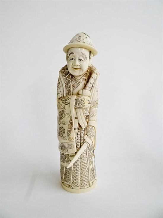 Appraisal: IVORY SAMURAI Japan st half- th century Robed samurai with