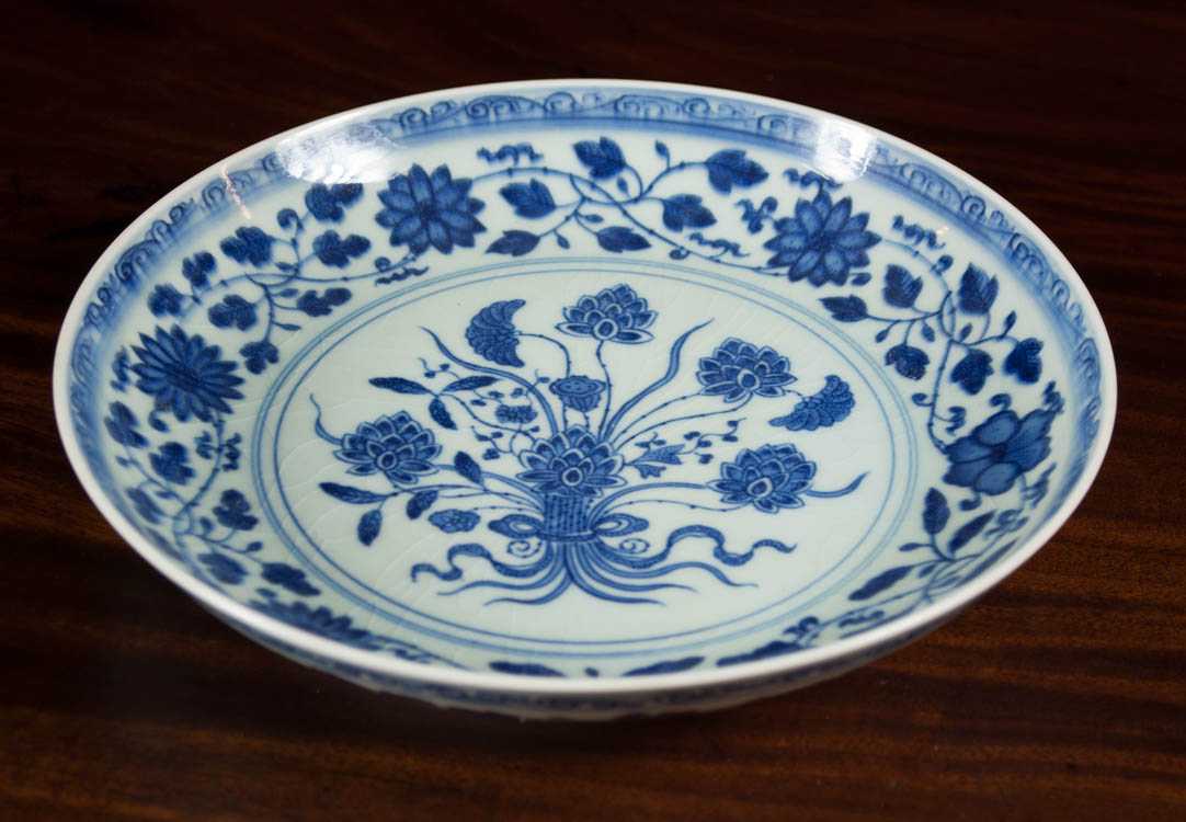 Appraisal: CHINESE BLUE AND WHITE PORCELAIN BOWL with low profile having