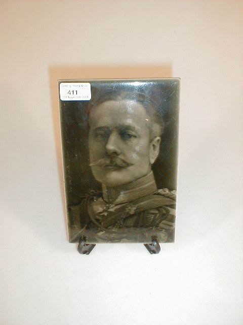 Appraisal: A grey glazed portrait tile - Field Marshall Sir Douglas