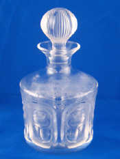 Appraisal: A Lalique panelled glass decanter and stopper signed 'Lalique France'