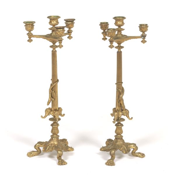 Appraisal: PAIR OF UNUSUAL ART NOUVEAU BRASS FOUR-LIGHT CANDELABRA Pair of