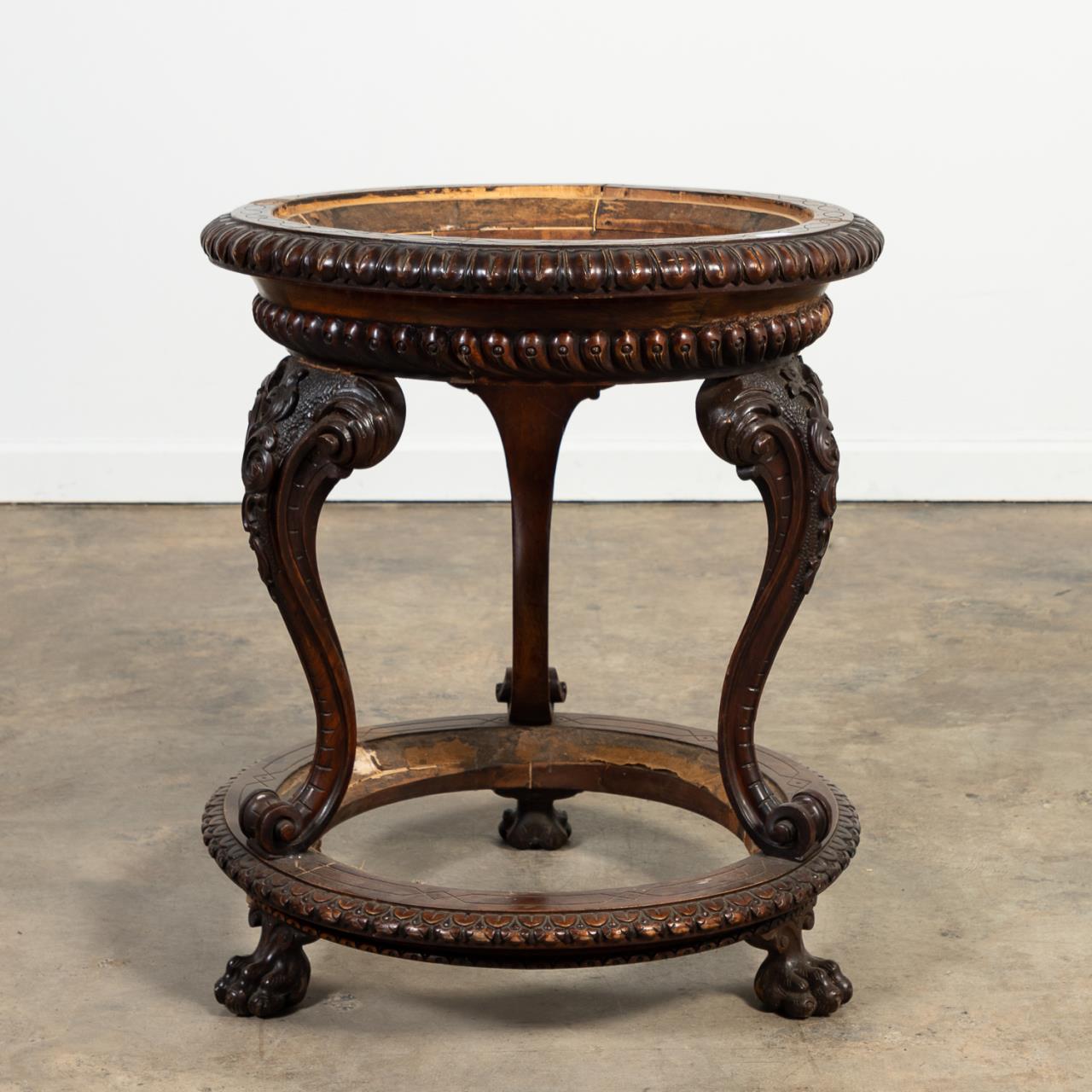 Appraisal: L TH C ROUND CARVED WOOD TWO TIER TABLE American