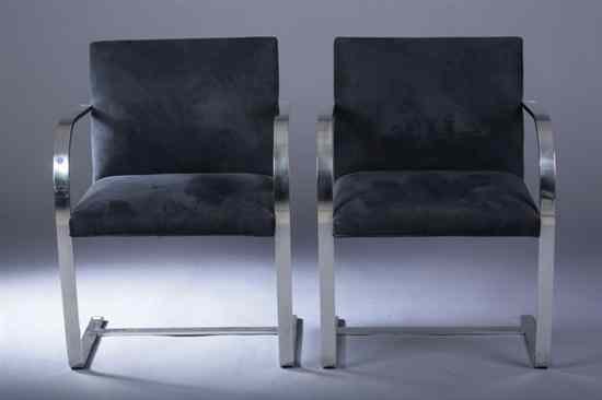 Appraisal: PAIR ART DECO STYLE CHROME OPEN-ARM CHAIRS Tight back and