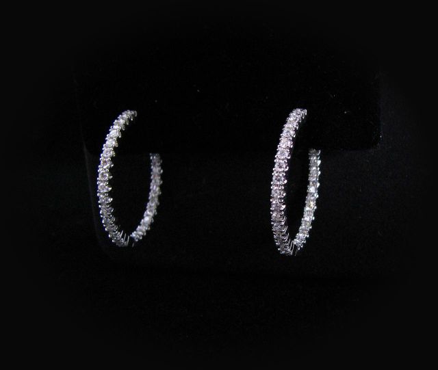 Appraisal: k white gold diamond inside out hoop earrings with approximately