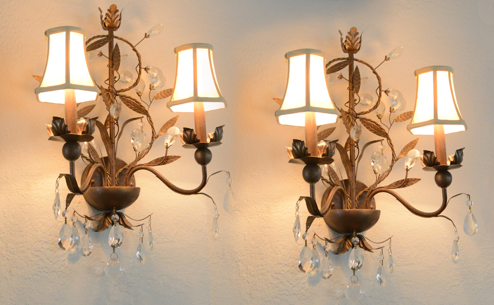 Appraisal: PAIR METAL CRYSTAL WALL SCONCES Electric light sconces with foliate