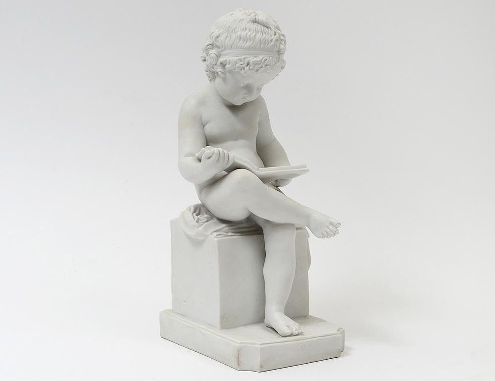 Appraisal: PARIAN-WARE FIGURE OF A BOY READING A BOOK Indistinctly signed