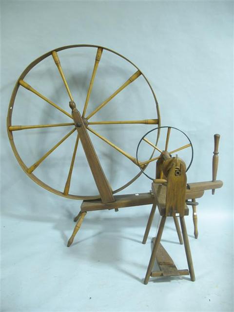 Appraisal: TWO AMERICAN SPINNING WHEELS th century one large h in