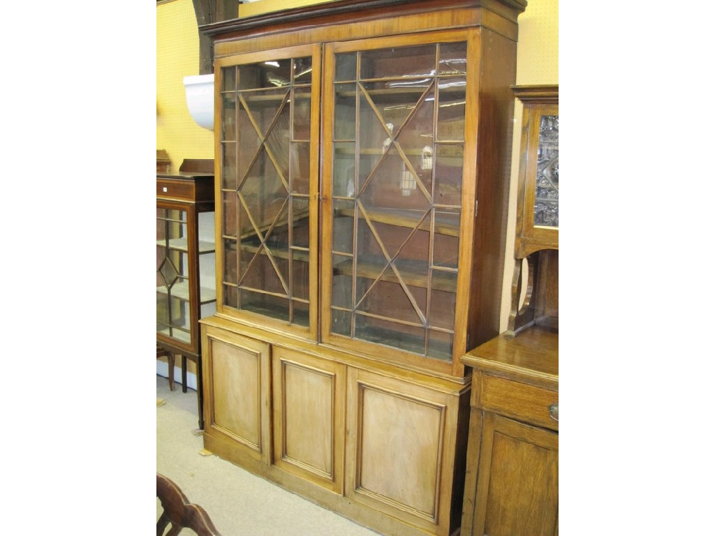 Appraisal: Victorian mahogany library bookcase the top with astragal glazed doors