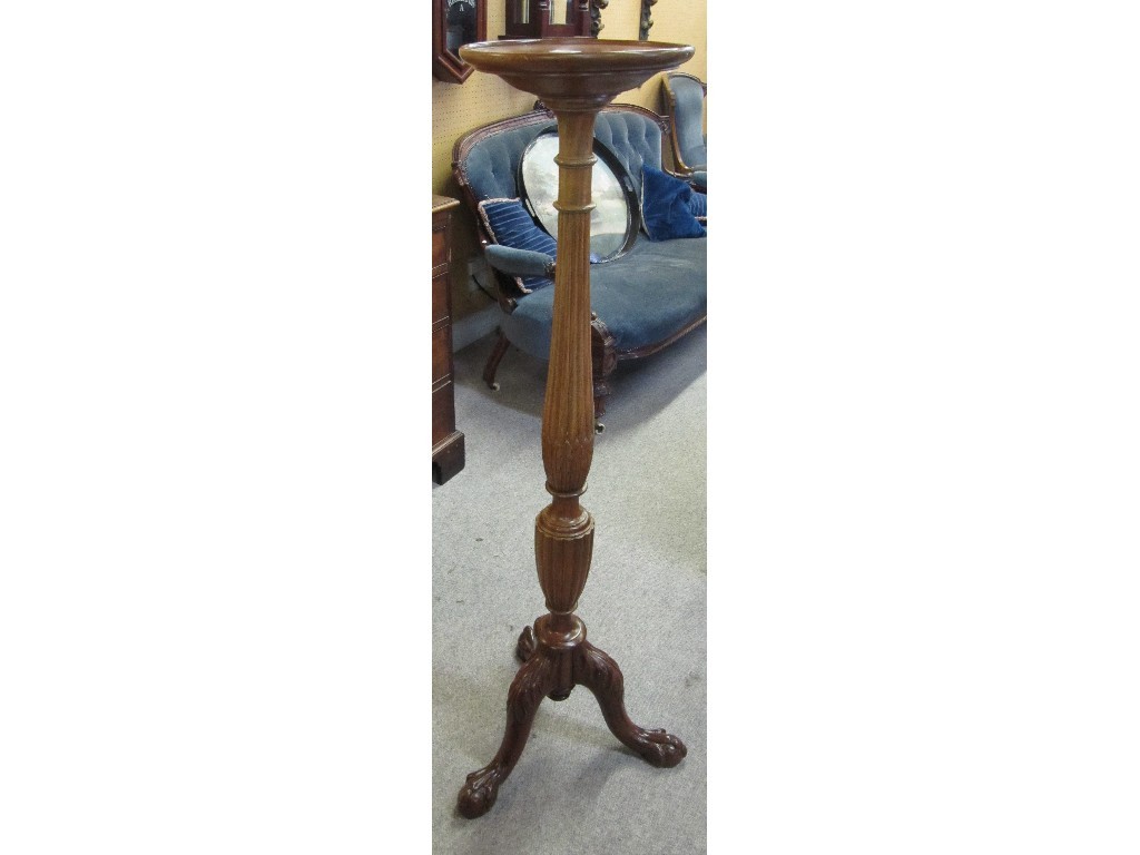 Appraisal: Mahogany torchere raised on tripod supports