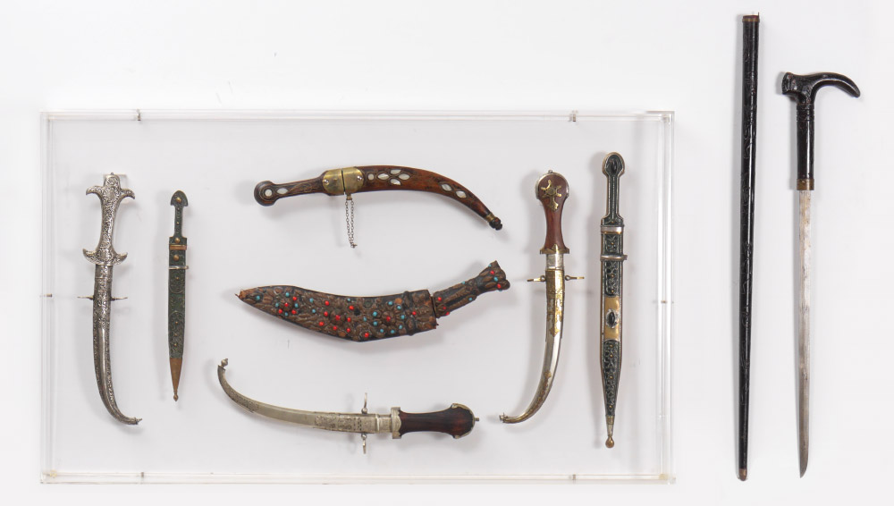 Appraisal: COLLECTION OF KINDJAL DAGGERS IN LUCITE DISPLAY Collection of assorted