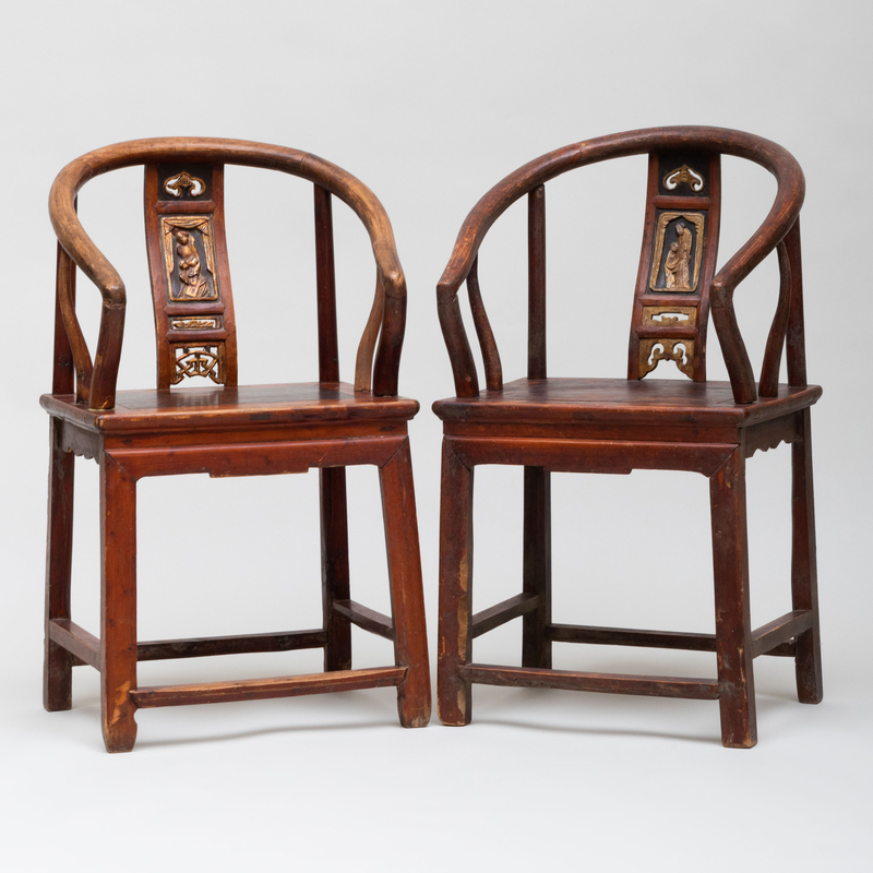 Appraisal: Two Chinese Hardwood Horseshoe Back Arm Chairs One with a