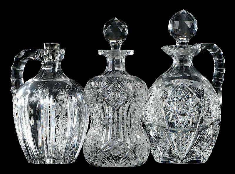 Appraisal: Two Cut Glass Whiskey Jugs Decanter corset-form decanter - in