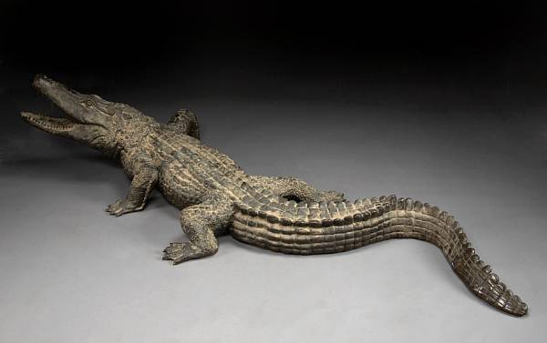 Appraisal: An imposing patinated bronze alligator fountainhead The alligator in a